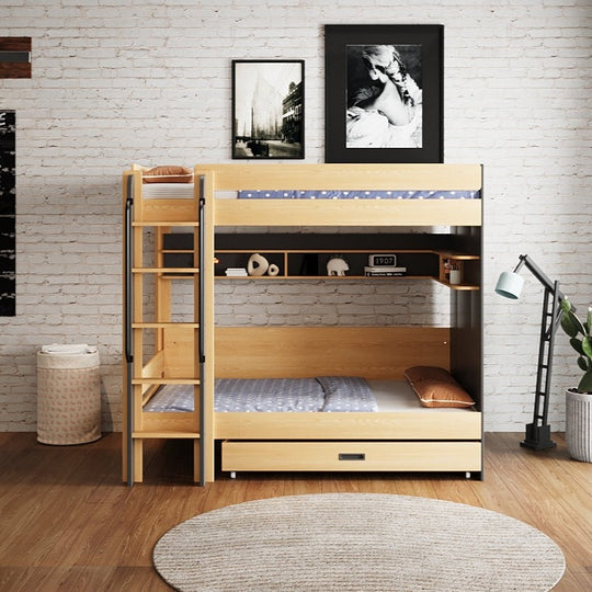A TEOM bunk bed with a ladder on the left side, upper bed with a blue and white bedding, lower bed with a beige mattress, set in a room with exposed brick walls, a picture on the wall, and a lamp.