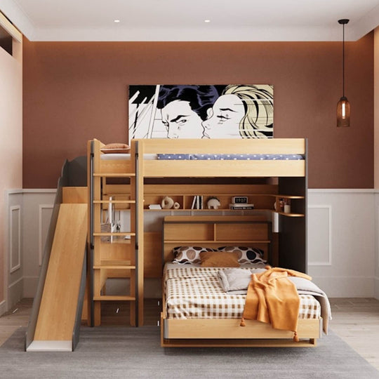 A loft bed with two beds, a bottom double bed and a top single bed, featuring a ladder, a desk, and shelves. The bed is set against a wall with a painting, and the room has a wooden floor and a hanging light fixture.